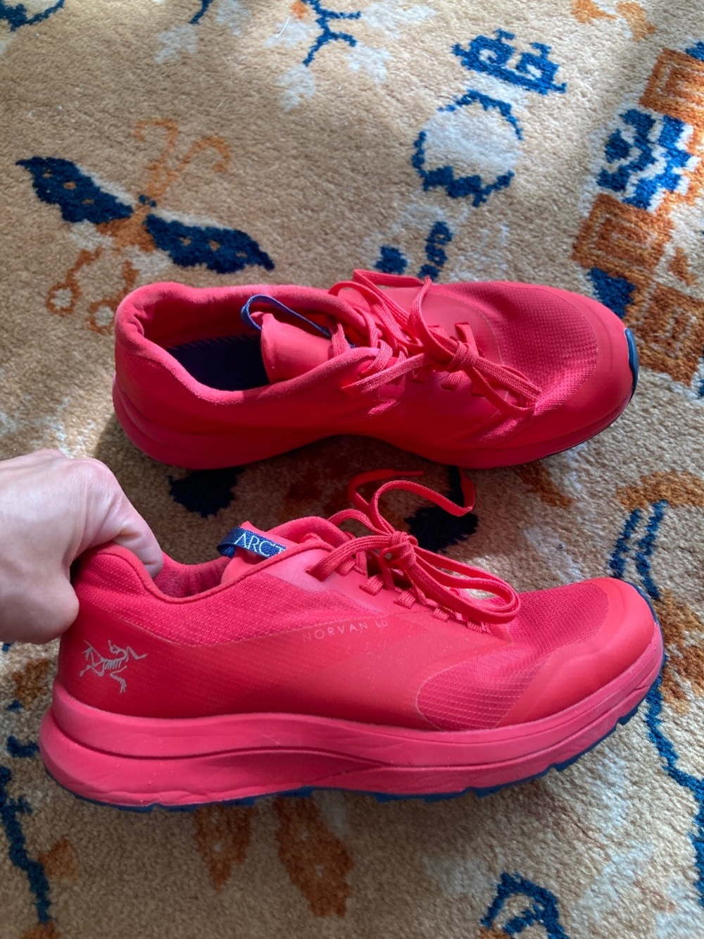 Women's size 7 like new Arc’teryx red sneakers